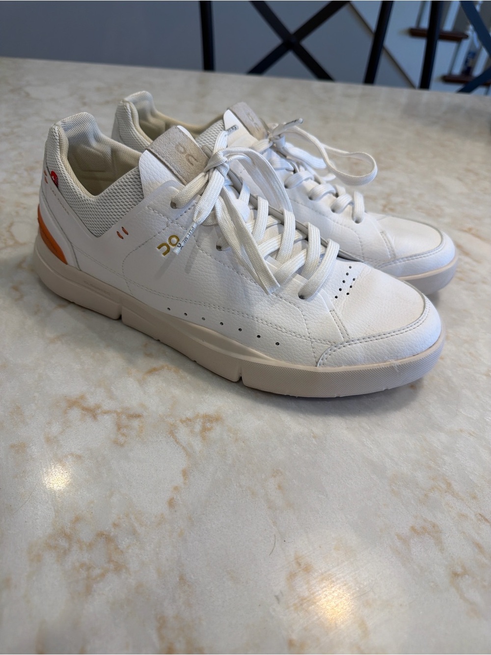 On Running The Roger with Orange Heel Accent